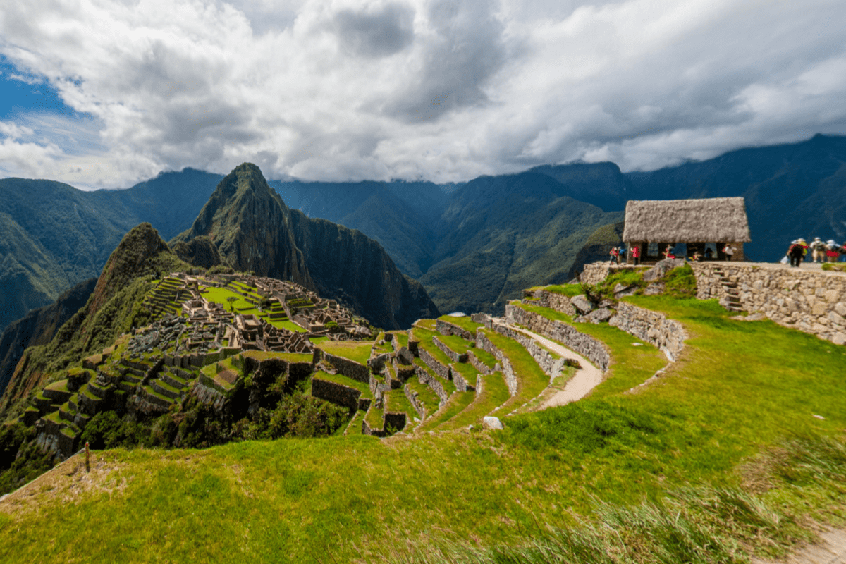 Panoramic view of Machu Picchu ruins in the Andes Mountains, Peru.